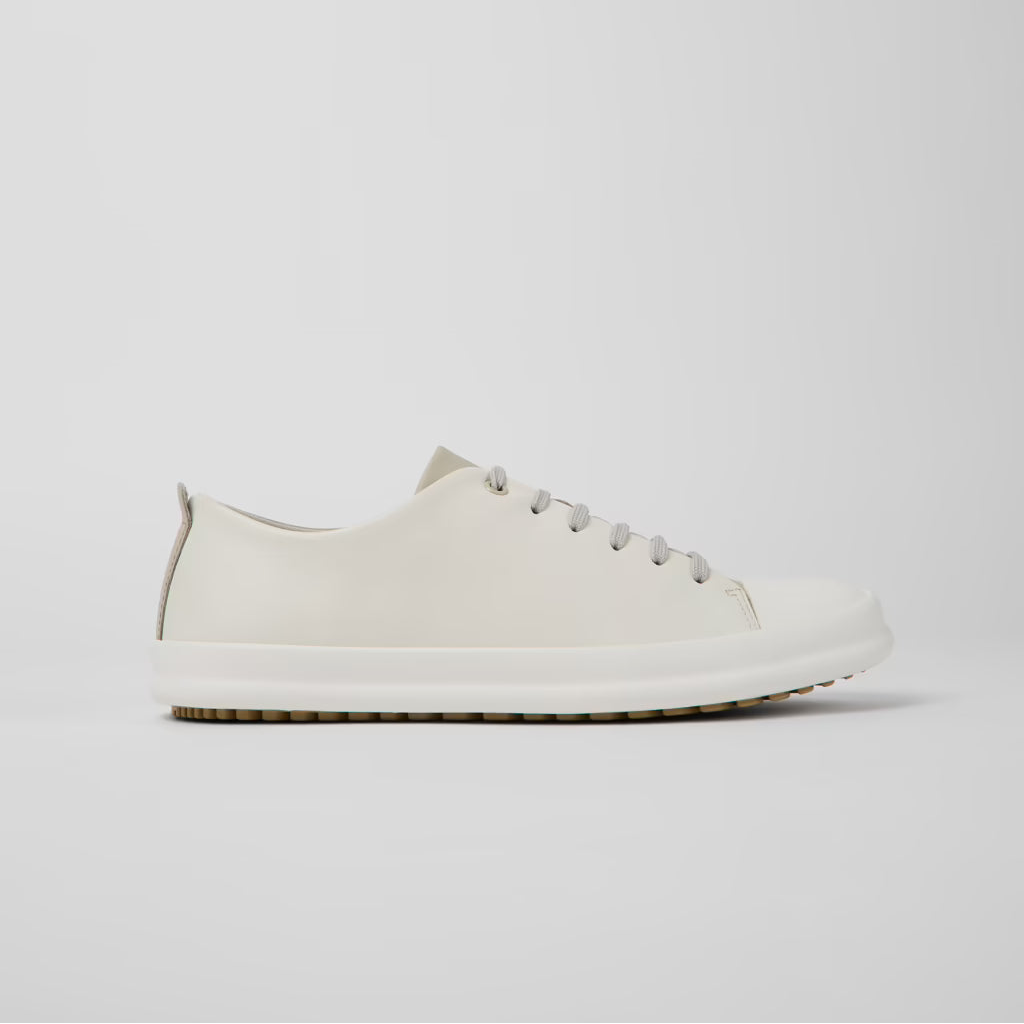 White sneaker on a light gray background
