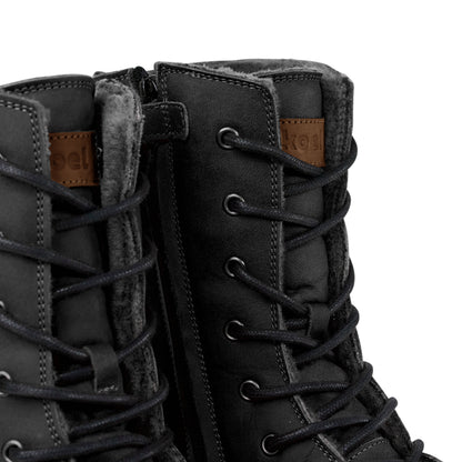 Close-up of the laces and wool lining on black Koel Faro Lambswool boots