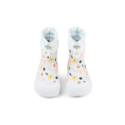 White Koel Wibi Print children's barefoot wellies with flowers, front view
